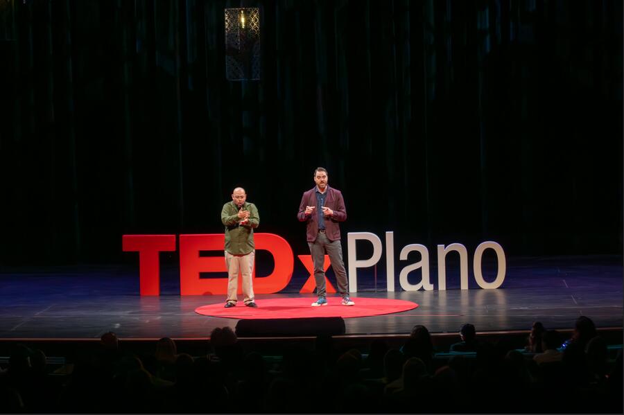 Michael Thomas and a co-presenter on the TEDxPlano stage.